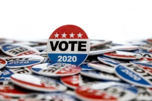 Election campaign buttons with the word vote